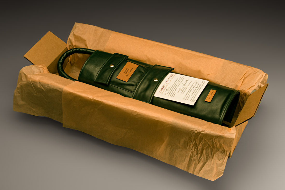 Photo of the Great Leather Drumstick Bag as it arrives in it's custom box suitable for gift wrapping, as a best gift for drummers. Each handmade drum stickbag is a numbered piece that comes with a personalized card signed by Great Leather's owner, and includes the drummers name, the unique number of the drum stick bag, and the identifying number of the top grain aniline leather cowhide that the bag was cut from.